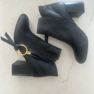 See by Chloe Elegant Black Ankle Boots with Gold Accent